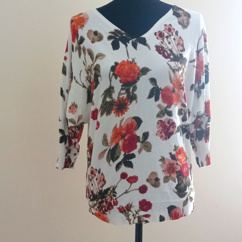 White sweater with flowers
